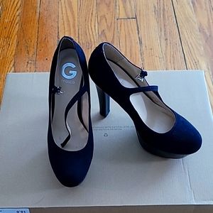 All black platform heels by Guess. size 9